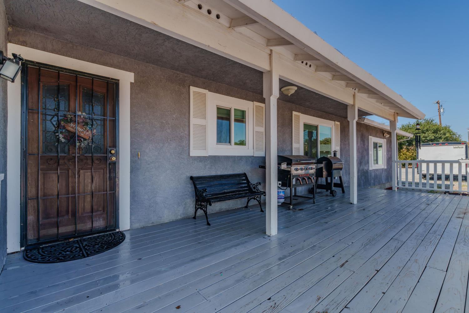 9680 Warren Road Valley Springs, CA 95252 - Photo 4 of 51 a dining room with furniture and wooden floor