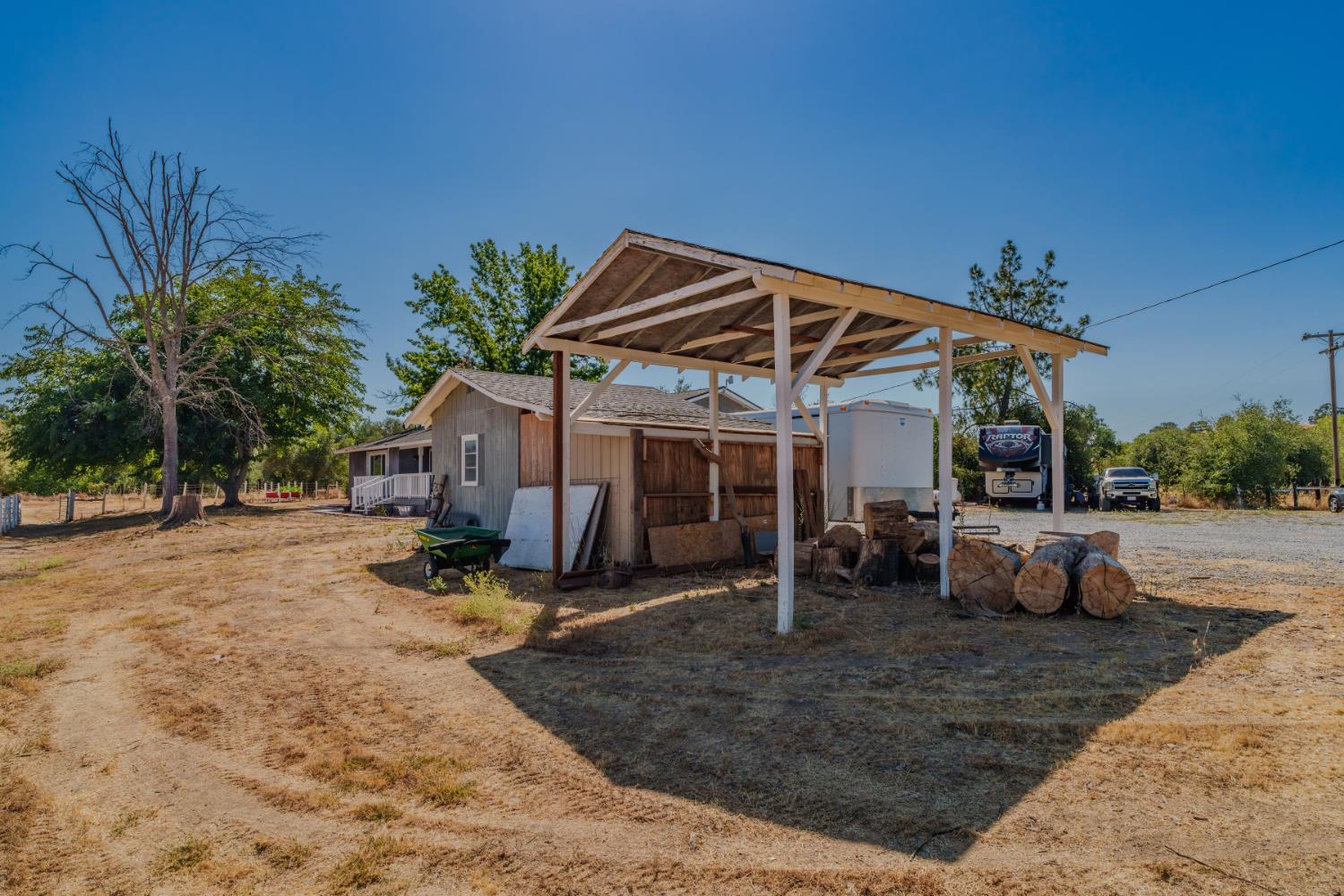 9680 Warren Road Valley Springs, CA 95252 - Photo 43 of 51 a view of a house with backyard and sitting area