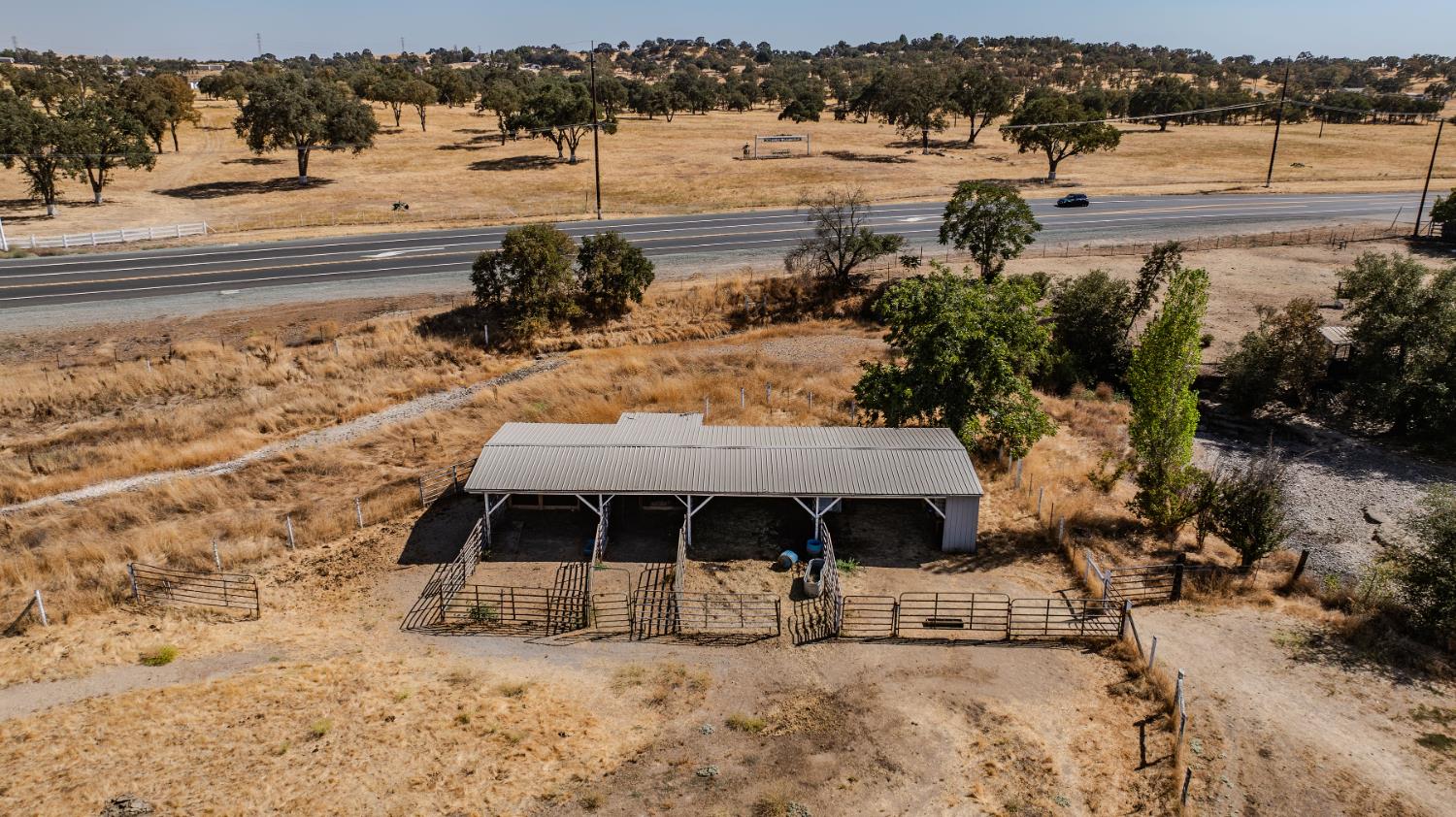 9680 Warren Road Valley Springs, CA 95252 - Photo 49 of 51 a view of a yard with wooden fence