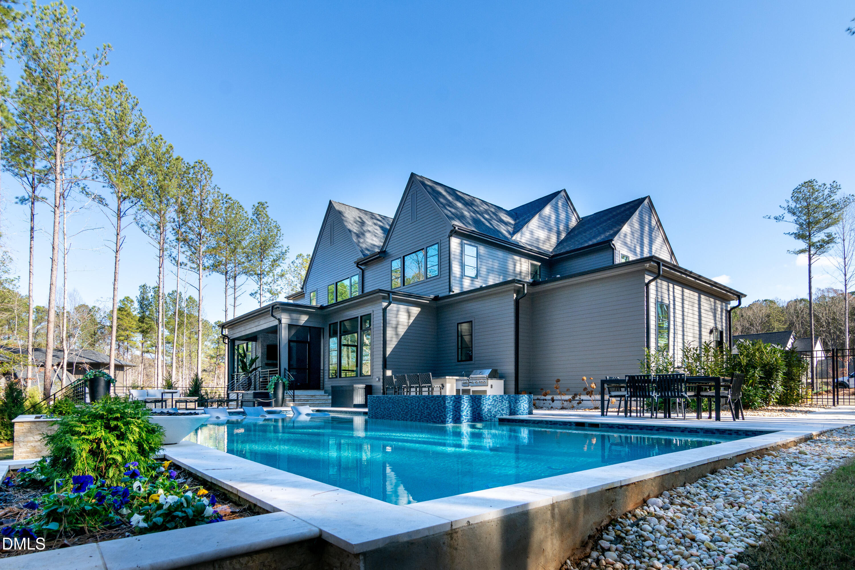 7644 Falls Creek Lane Raleigh, NC 27614 - Photo 9 of 58 a view of a house with swimming pool and sitting area
