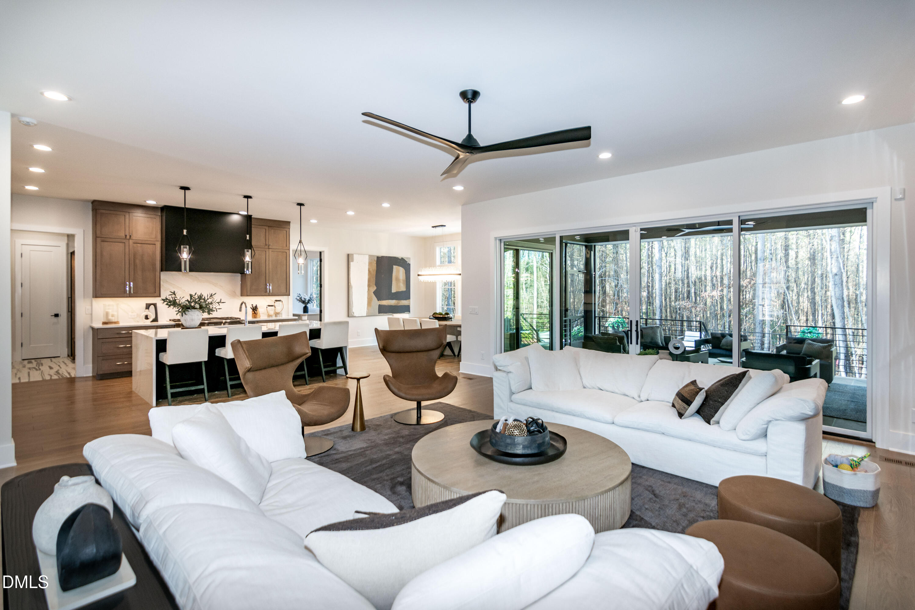7644 Falls Creek Lane Raleigh, NC 27614 - Photo 14 of 58 a living room with furniture kitchen view and a large window