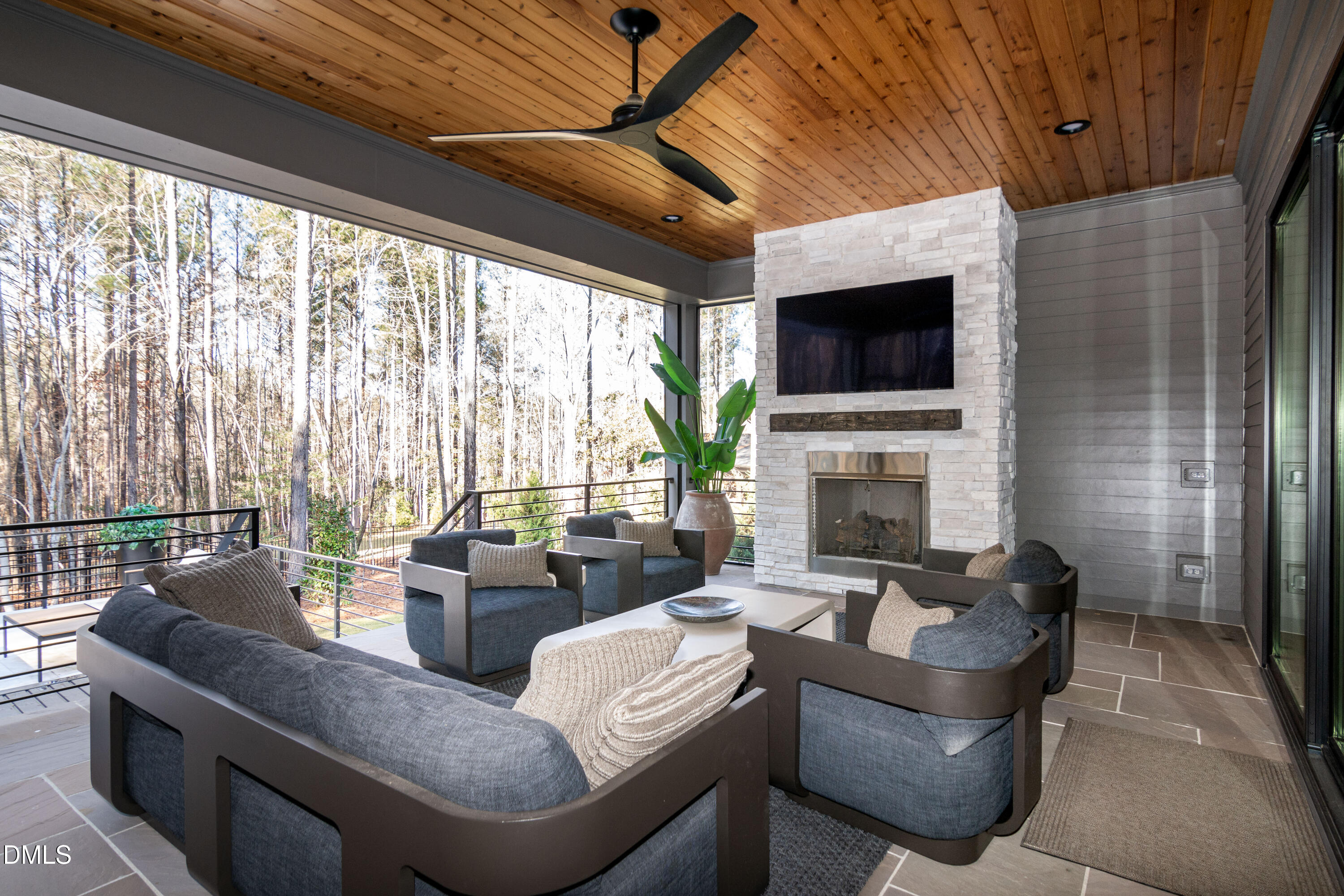 7644 Falls Creek Lane Raleigh, NC 27614 - Photo 15 of 58 a living room with fireplace furniture and a flat screen tv