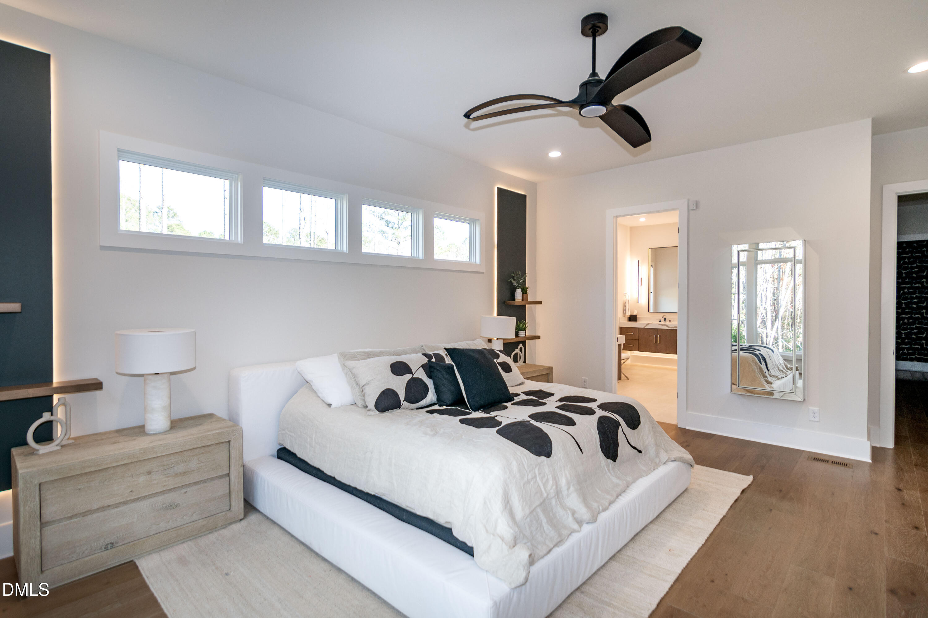 7644 Falls Creek Lane Raleigh, NC 27614 - Photo 29 of 58 a bedroom with a bed and ceiling fan