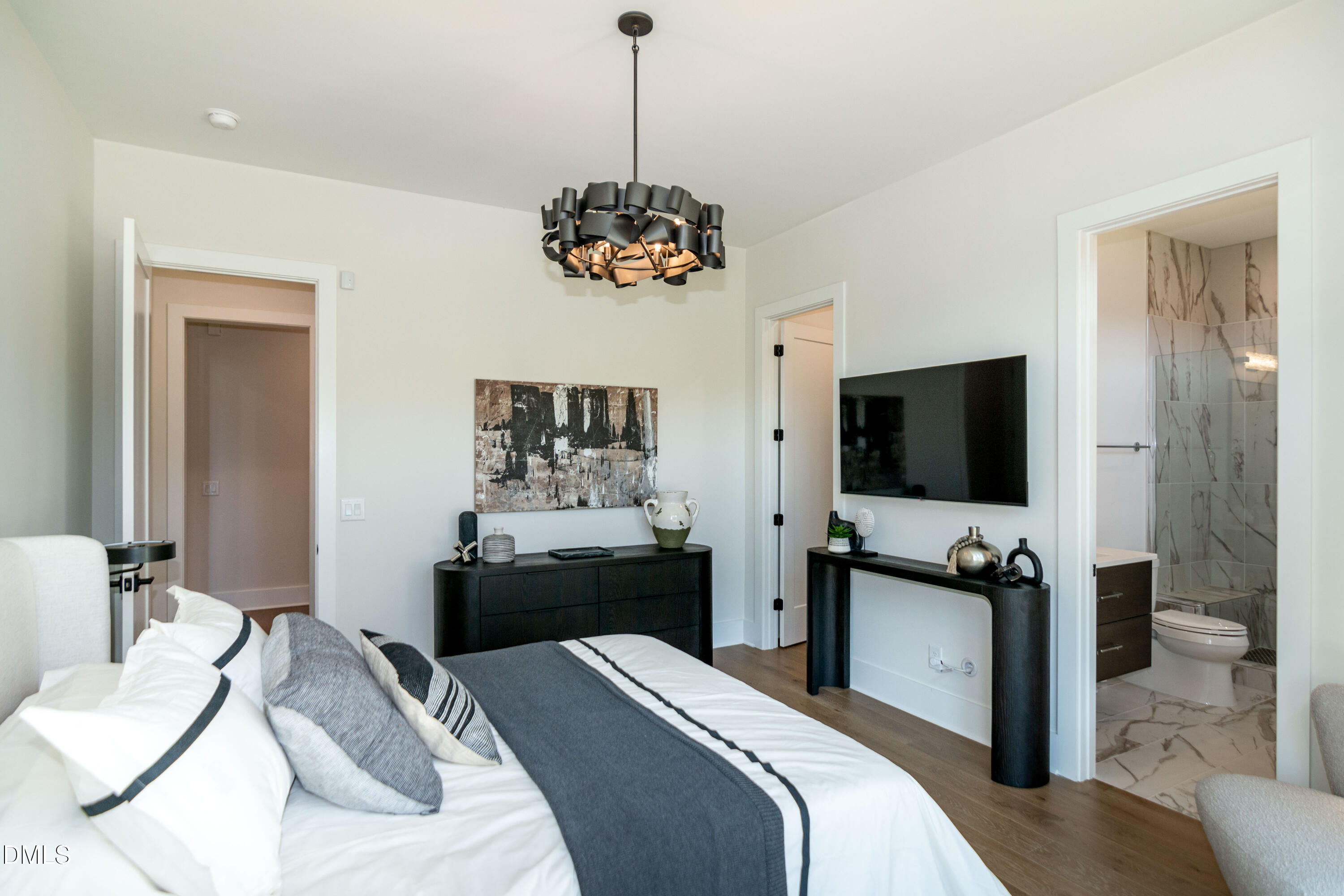 7644 Falls Creek Lane Raleigh, NC 27614 - Photo 33 of 58 a bedroom with a bed and a flat screen tv