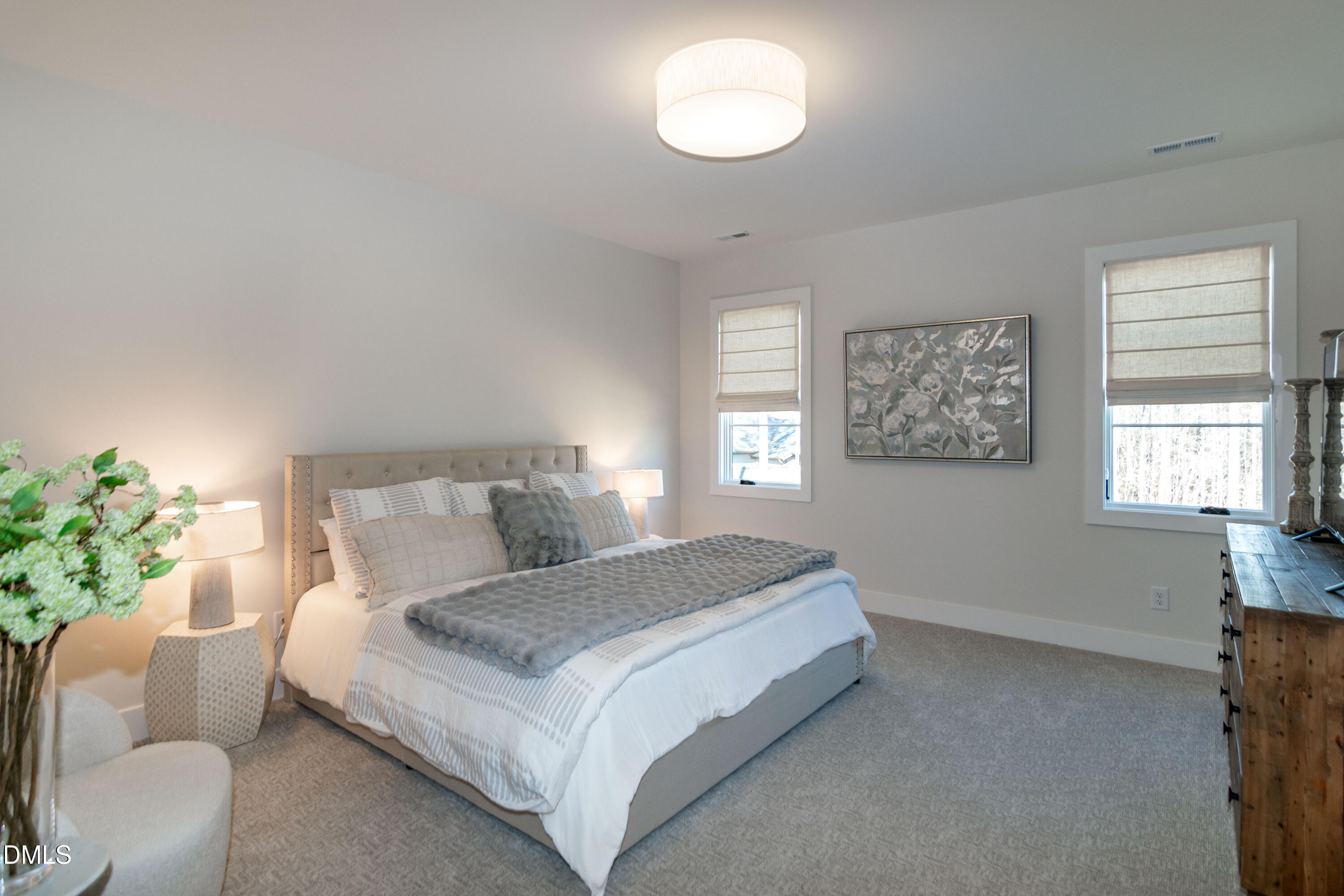 7644 Falls Creek Lane Raleigh, NC 27614 - Photo 39 of 58 a bedroom with a bed and a couch