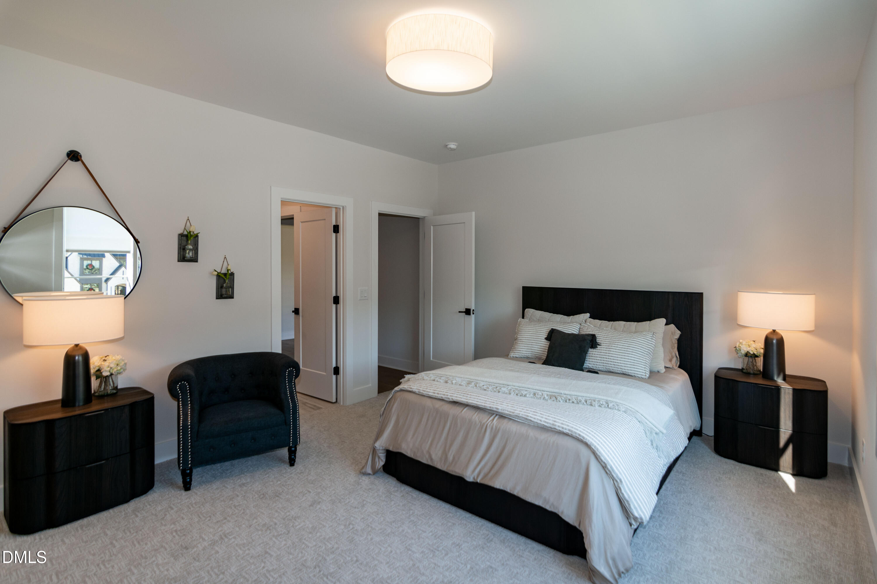 7644 Falls Creek Lane Raleigh, NC 27614 - Photo 50 of 58 a bedroom with bed mirror and window