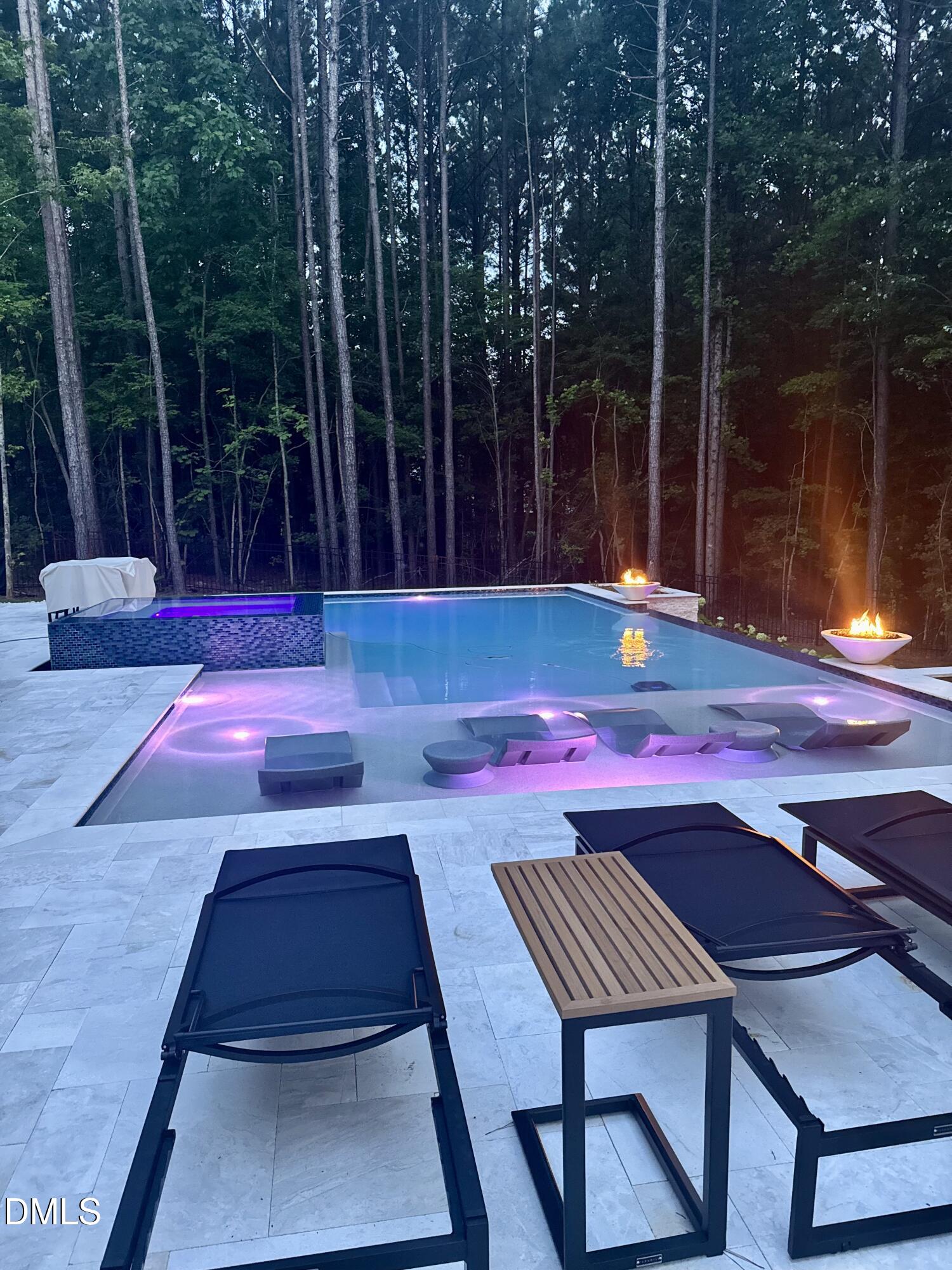 7644 Falls Creek Lane Raleigh, NC 27614 - Photo 5 of 58 a view of a backyard with sitting area