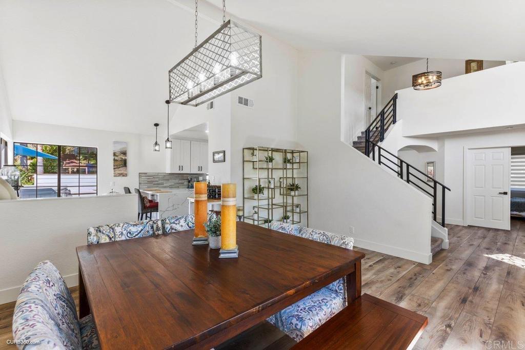1618 Buttercup Road Encinitas, CA 92024 - Photo 12 of 33 a view of dining room and livingroom with furniture