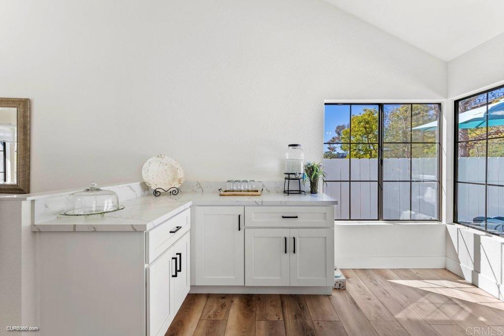 1618 Buttercup Road Encinitas, CA 92024 - Photo 13 of 33 a room with a sink and a window