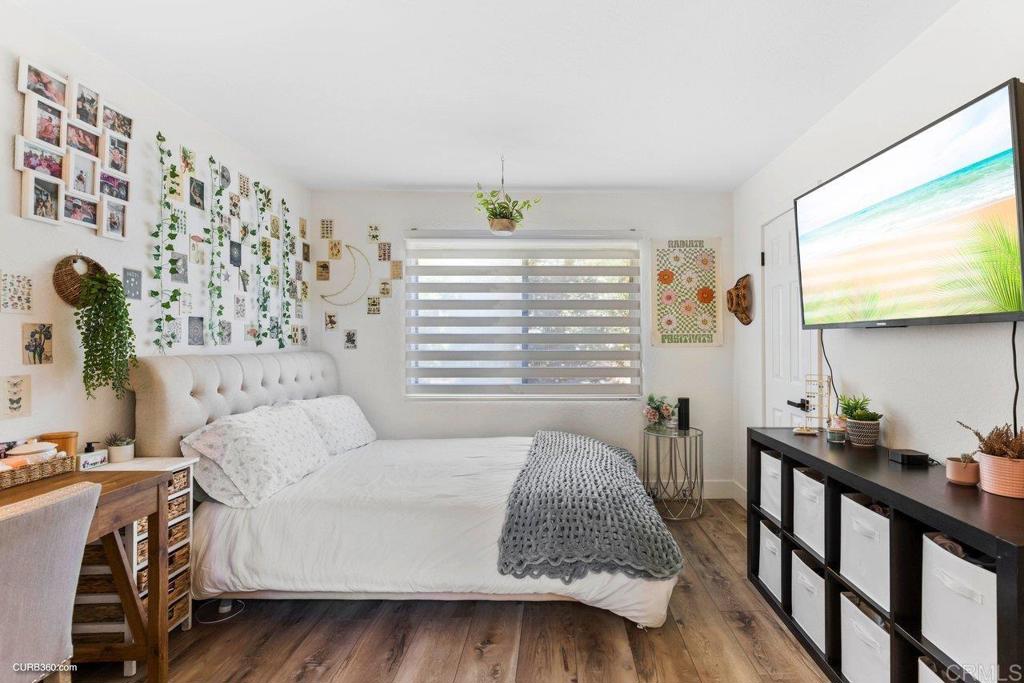 1618 Buttercup Road Encinitas, CA 92024 - Photo 18 of 33 a living room with furniture and next to a window