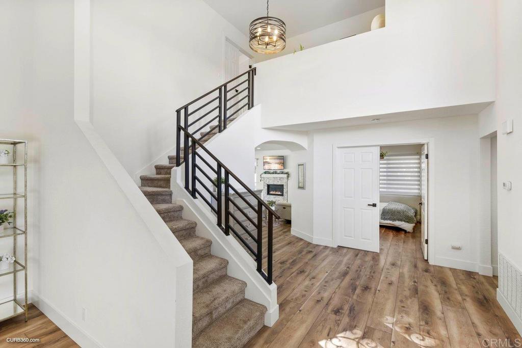 1618 Buttercup Road Encinitas, CA 92024 - Photo 20 of 33 a view of entryway and hall with wooden floor