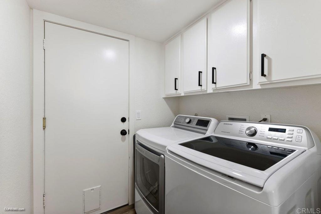1618 Buttercup Road Encinitas, CA 92024 - Photo 29 of 33 a utility room with dryer and washer