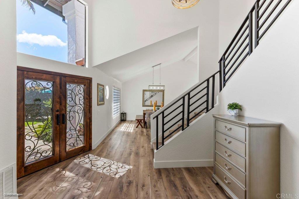 1618 Buttercup Road Encinitas, CA 92024 - Photo 4 of 33 a view of entryway and hall with wooden floor
