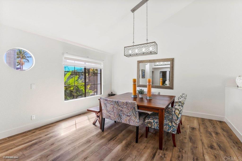 1618 Buttercup Road Encinitas, CA 92024 - Photo 8 of 33 a view of a dining room with furniture window and outside view