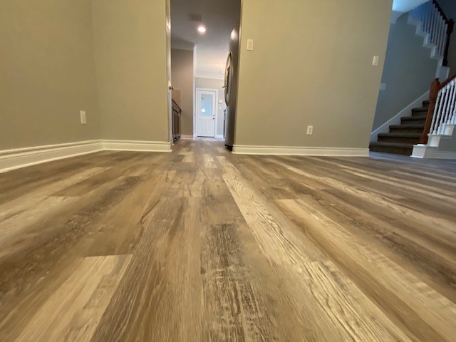 3415 Clearview Circle Houston, TX 77025 - Photo 6 of 16 a view of an empty room with wooden floor