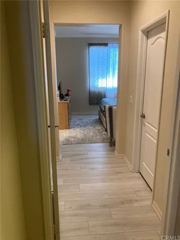 a view of hallway with livingroom and hallway