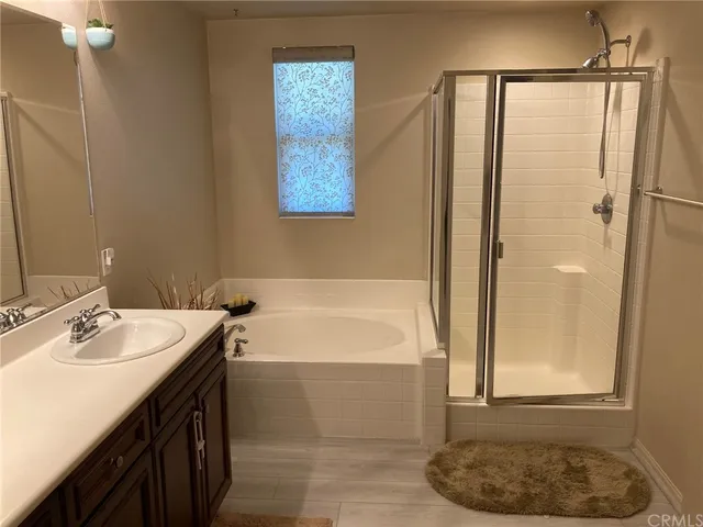 a bathroom with a bathtub and a sink