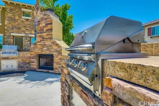 a room with gym equipment and large mirror
