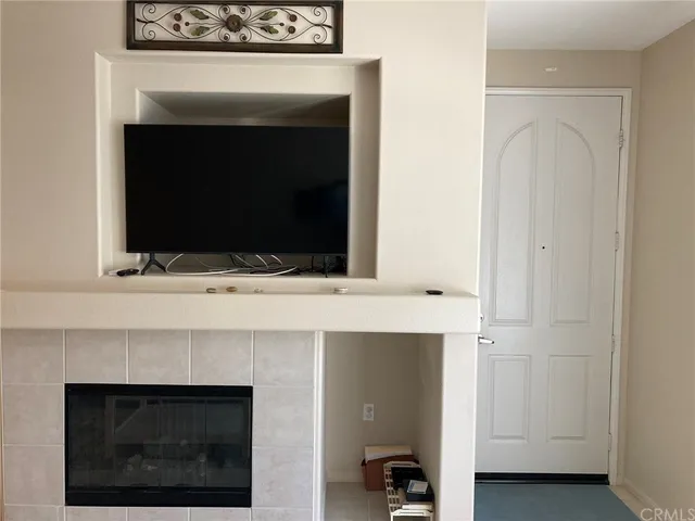 a bathroom with a fireplace and a sink