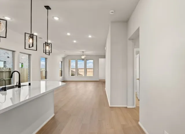 a view of a kitchen and a sink