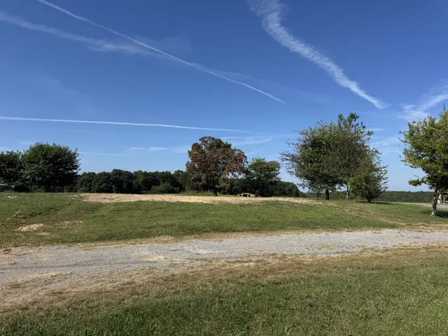 a view of a field and a big yard