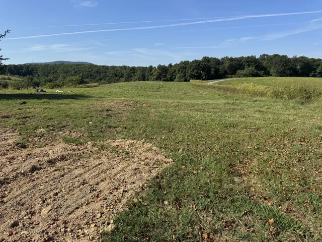 a view of lake and mountain