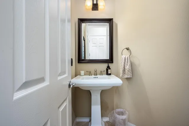 a lobby with furniture and floor to ceiling window