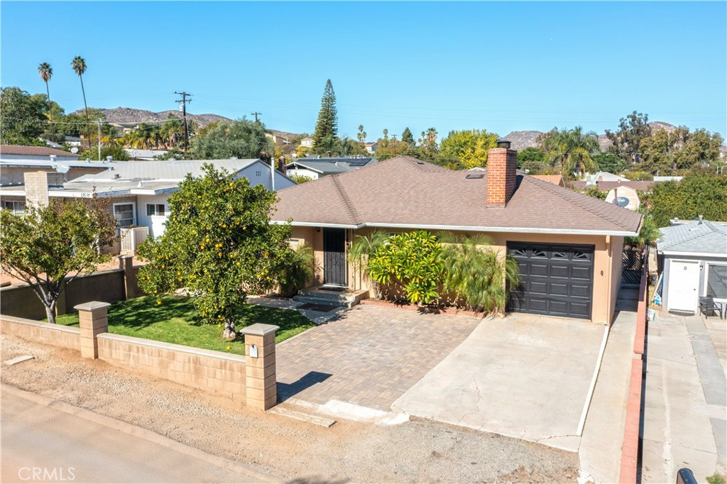 11665 Valverda Avenue Riverside, CA 92505 - Photo 12 of 53 a view of a house with outdoor space and sitting area