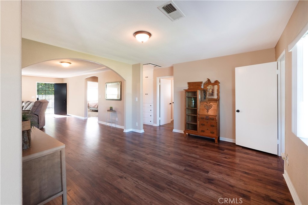11665 Valverda Avenue Riverside, CA 92505 - Photo 19 of 53 a view of a livingroom with wooden floor