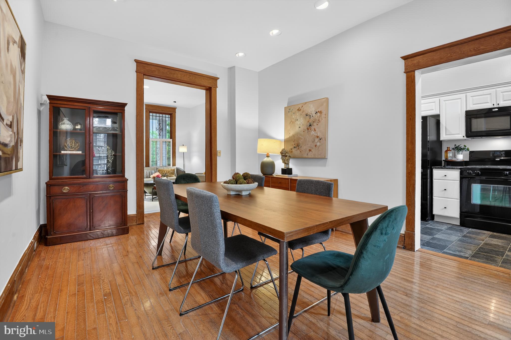 1752 Willard Street Northwest Washington, DC 20009 - Photo 11 of 26 a view of a dining room with furniture and wooden floor