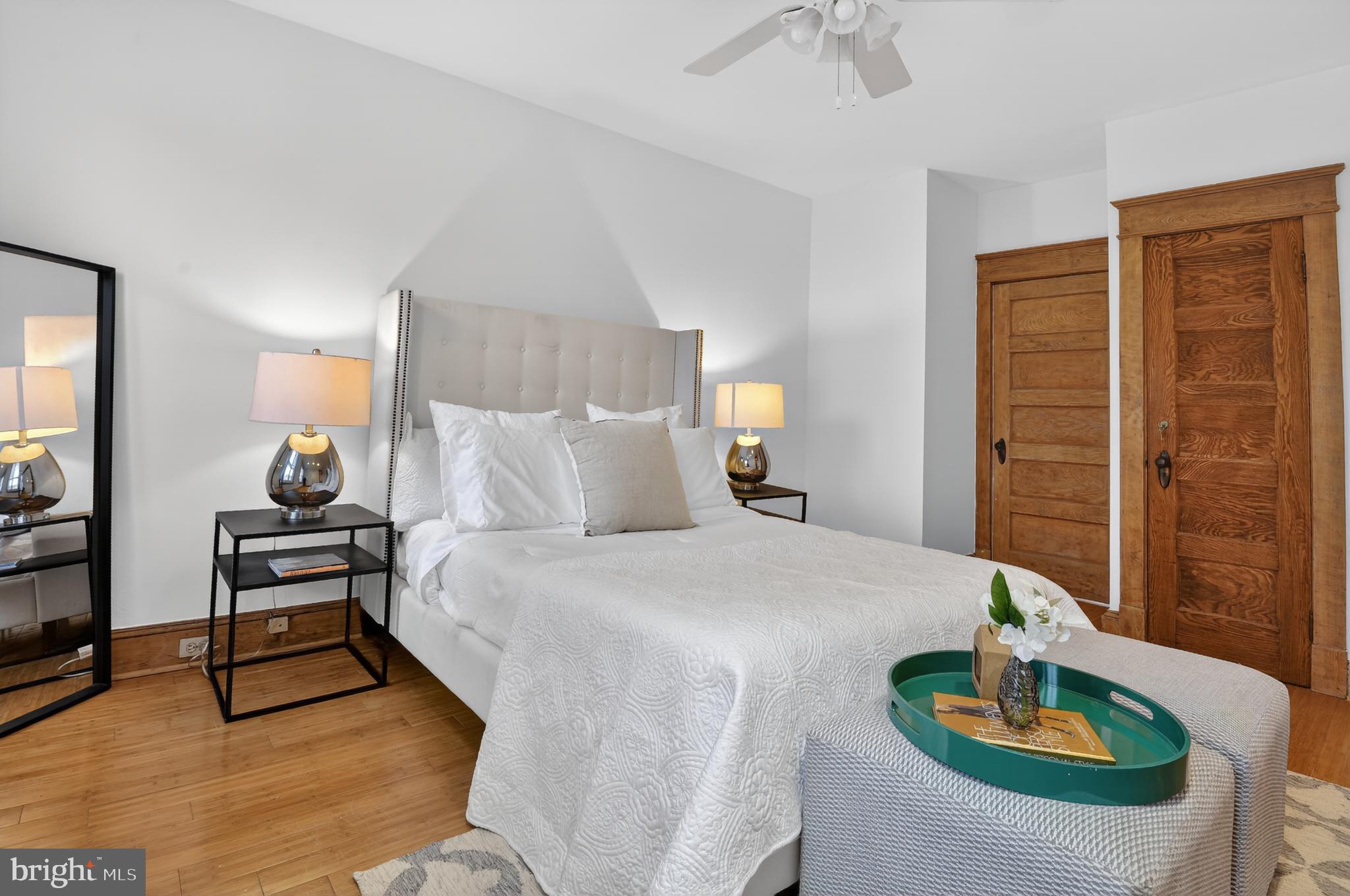 1752 Willard Street Northwest Washington, DC 20009 - Photo 15 of 26 a bedroom with a bed and a table