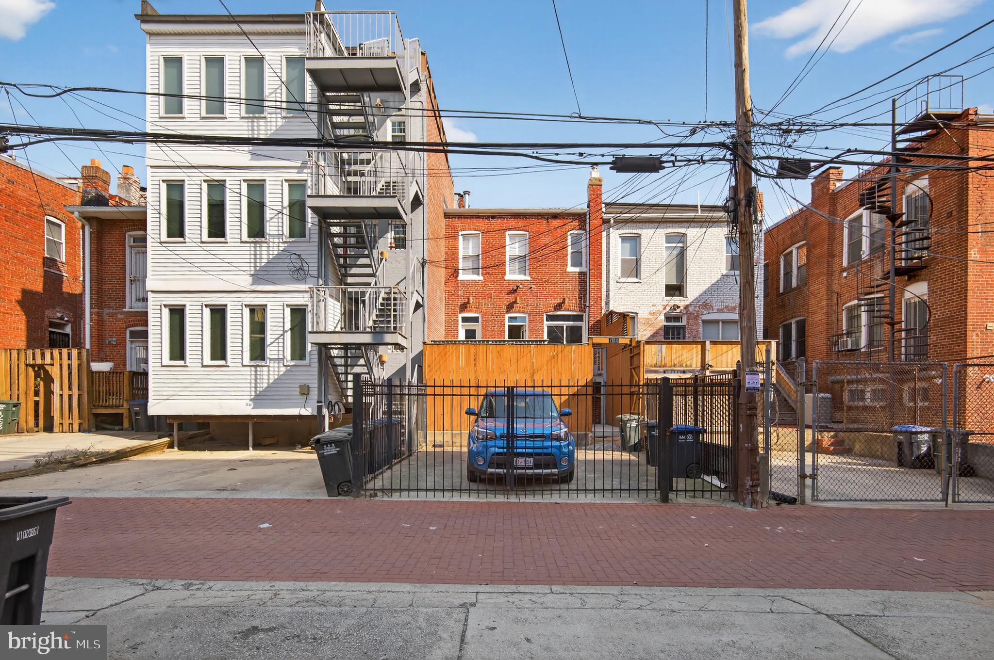1752 Willard Street Northwest Washington, DC 20009 - Photo 21 of 26 a view of a building with a street