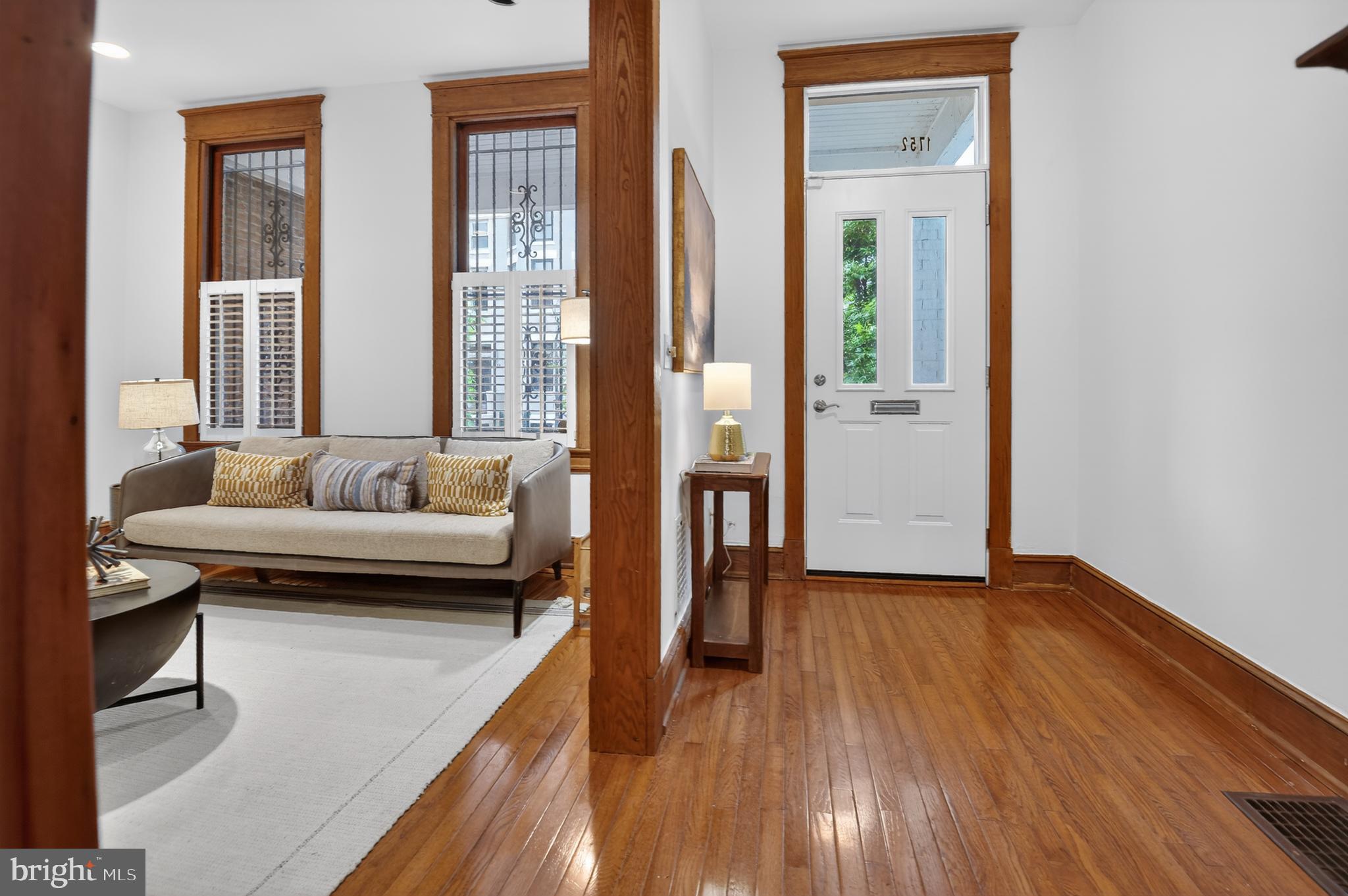 1752 Willard Street Northwest Washington, DC 20009 - Photo 7 of 26 a view of a bedroom with furniture and wooden floor