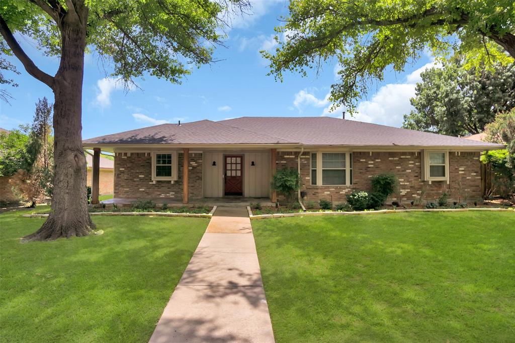 3805 Cemetery Hill Road Carrollton, TX 75007 - Photo 1 of 1 a front view of a house with a yard