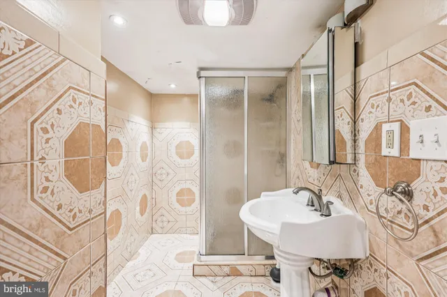 a bathroom with a sink and a shower