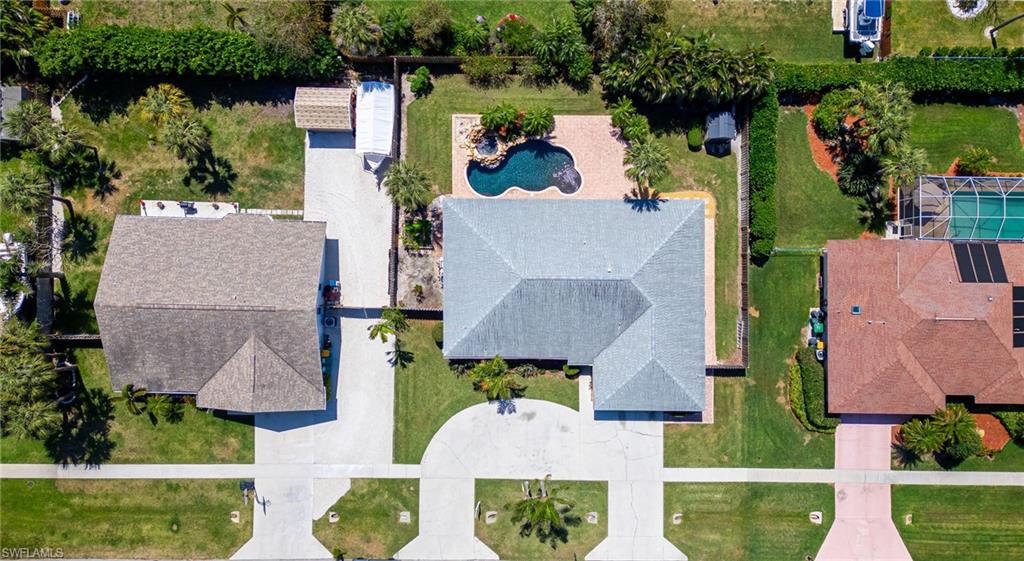 2360 Outrigger Lane Naples, FL 34104 - Photo 48 of 50 an aerial view of houses with outdoor space