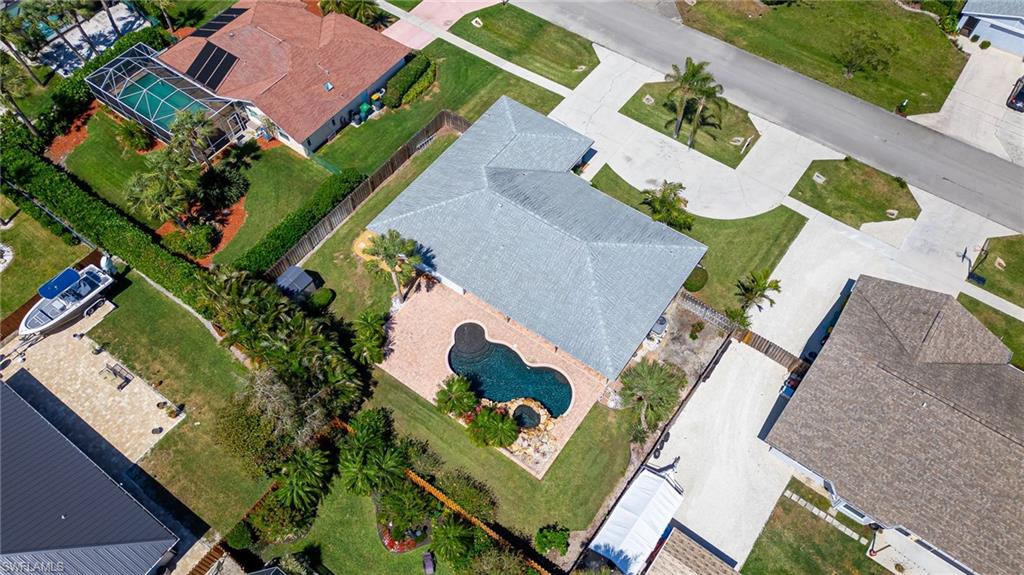 2360 Outrigger Lane Naples, FL 34104 - Photo 49 of 50 an aerial view of a house with a yard and potted plants
