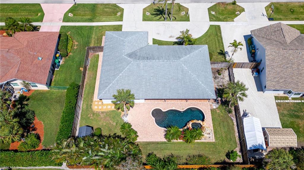 2360 Outrigger Lane Naples, FL 34104 - Photo 50 of 50 an aerial view of a house with a swimming pool