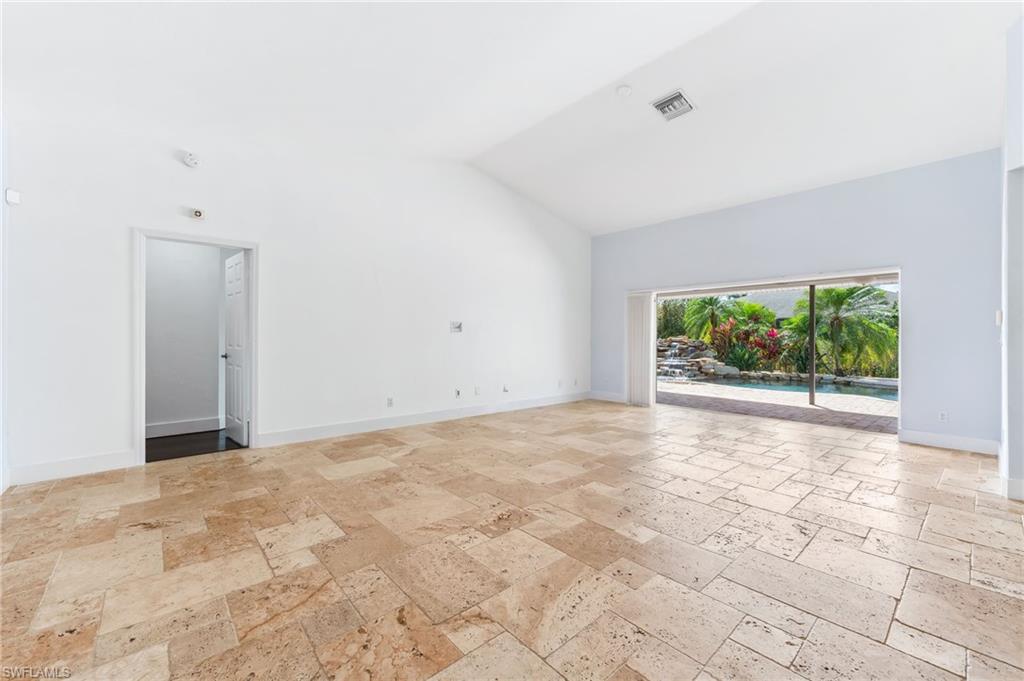 2360 Outrigger Lane Naples, FL 34104 - Photo 7 of 50 a view of an empty room with a window