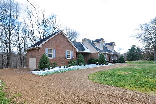 328 View Ridge Drive Goodlettsville, TN 37072 - Photo 2 of 20 This all Brick Cape Code Home is located on 1.72 Acres, it offers a Large 2 Car Garage and a Circular Driveway.