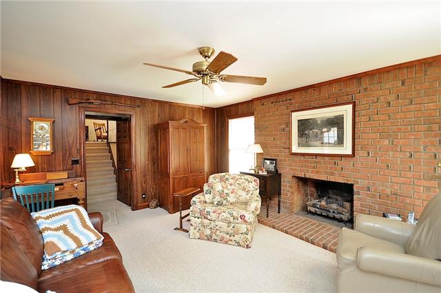 328 View Ridge Drive Goodlettsville, TN 37072 - Photo 15 of 20 The Cozy Den is located between the Kitchen and Bonus Room. It has a Brick Masonry Fireplace. (Present Owners have Installed Gas Logs) Fireplace can be used as Woodburning if Logs are removed and Damper Opened.