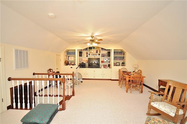 328 View Ridge Drive Goodlettsville, TN 37072 - Photo 17 of 20 The 24x19 Bonus Room is located just off the Den area above the Garage. It offers a Built-In Entertainment Center flanked by Bookcases.