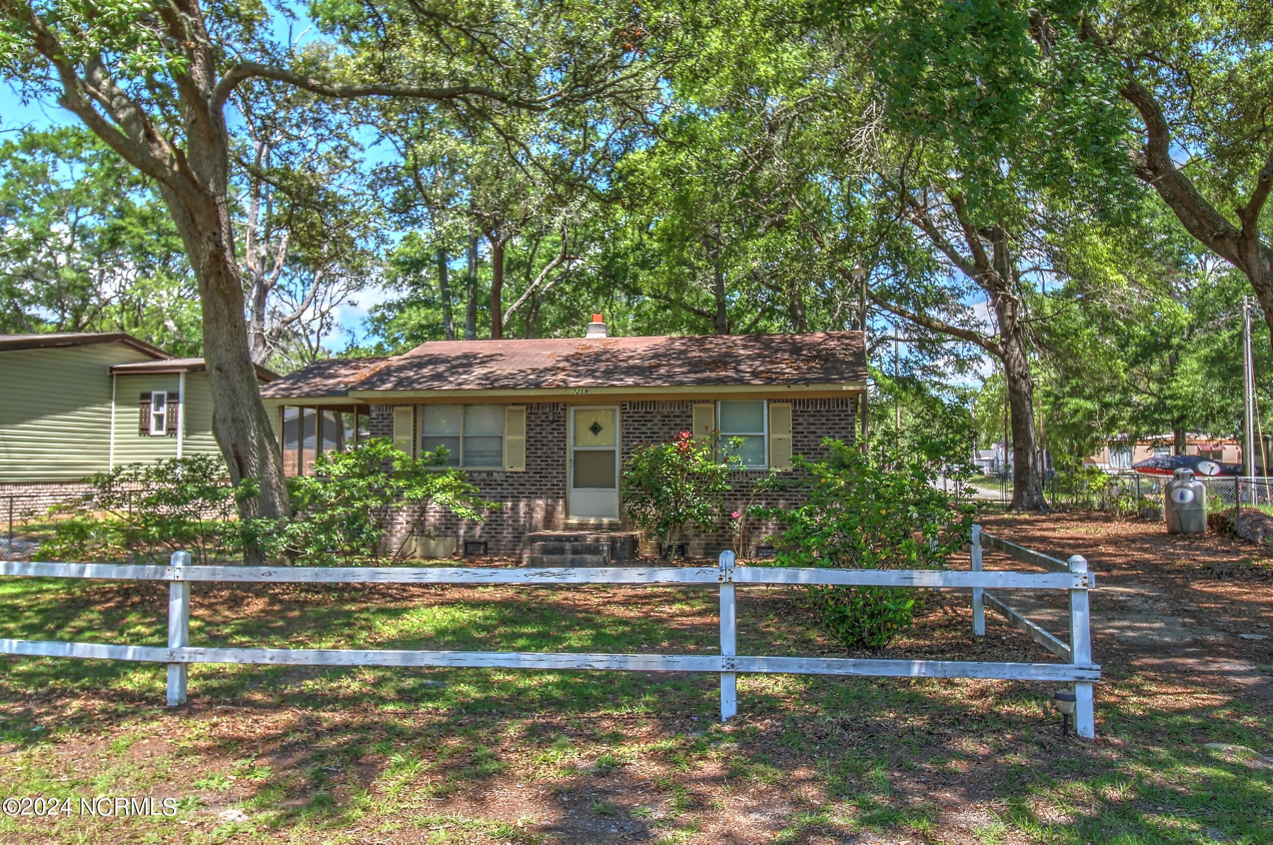 7259 Bo Tuck Road Southwest Ocean Isle Beach, NC 28469 - Photo 1 of 15 House Front 5