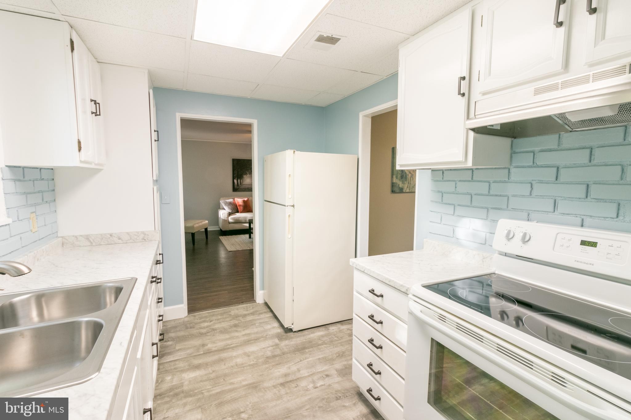 7 Crescent Road, Unit E Greenbelt, MD 20770 - Photo 10 of 25 New flooring, paint and hardware too!