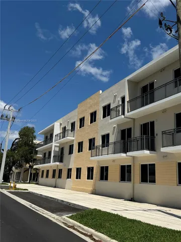 a view of a balcony with chairs