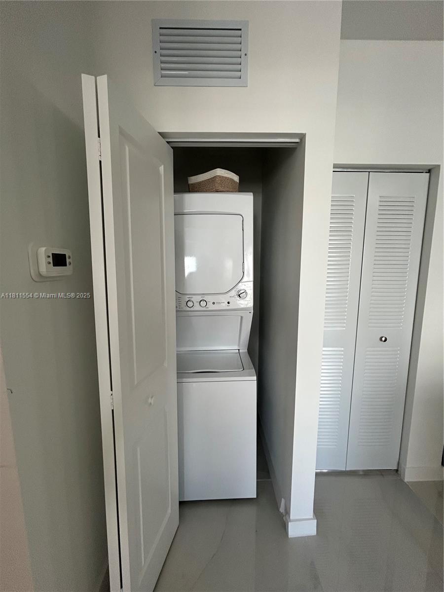 1010 Southwest 69th Avenue, Unit 212 Miami, FL 33144 - Photo 30 of 30 a utility room with washing machine