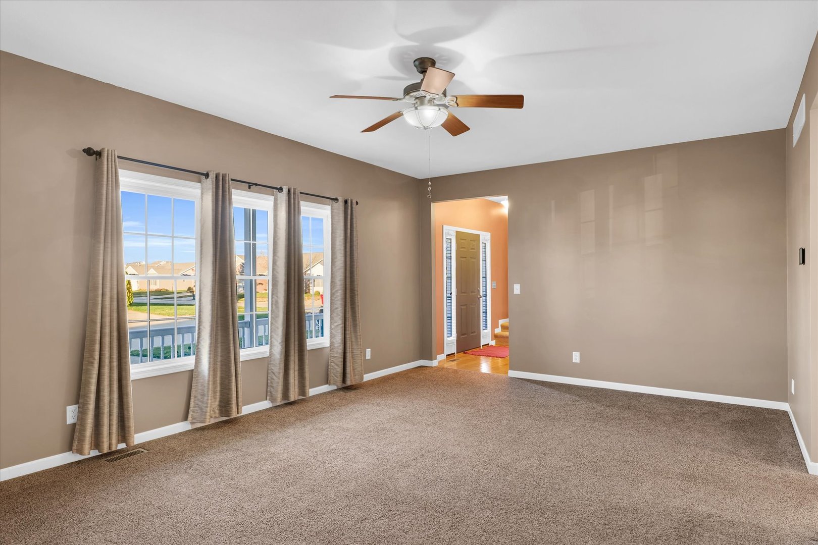1330 West Ridge Lane Champaign, IL 61822 - Photo 13 of 39 a view of an empty room with a window