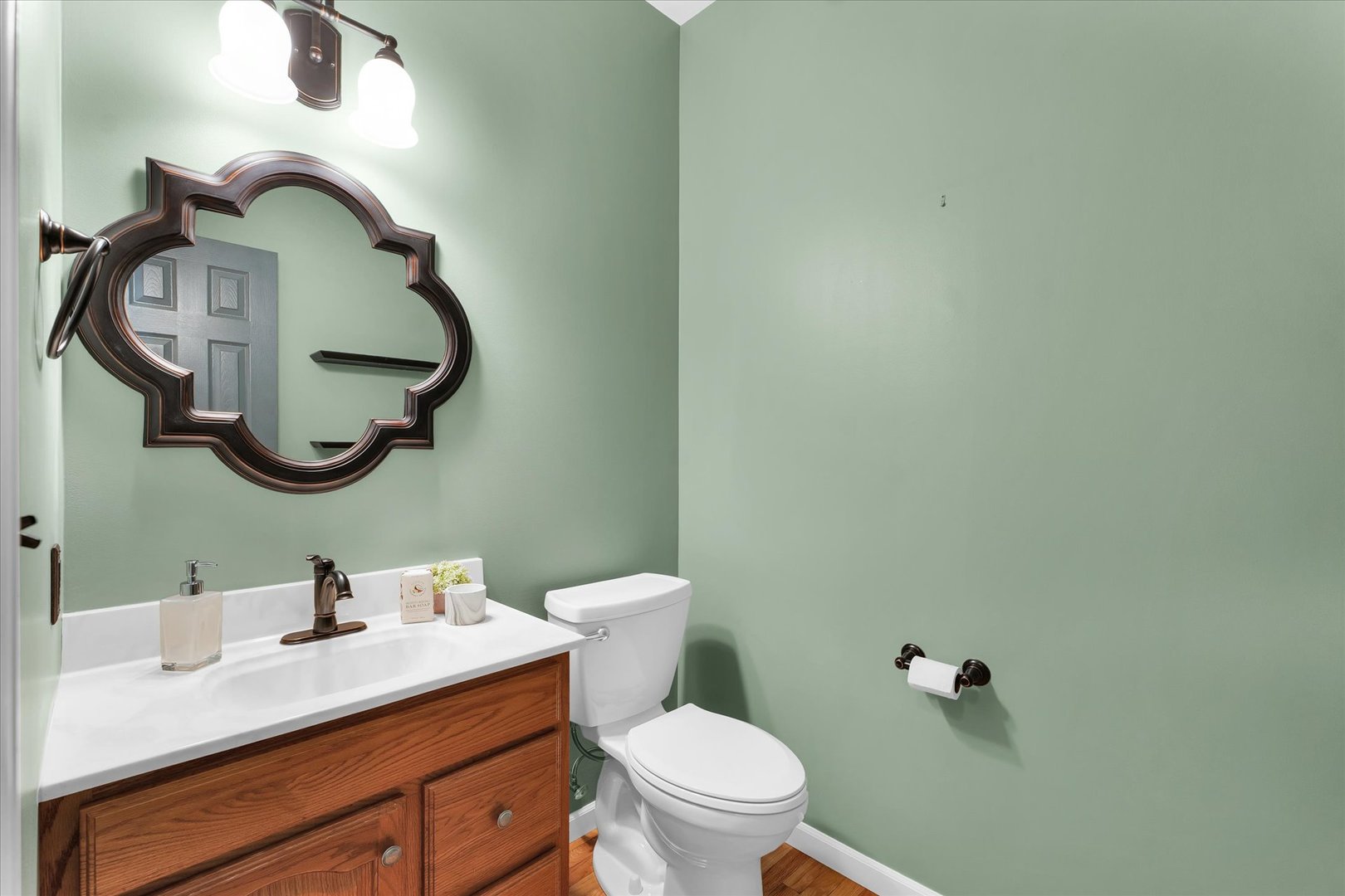 1330 West Ridge Lane Champaign, IL 61822 - Photo 19 of 39 a bathroom with a toilet and a sink