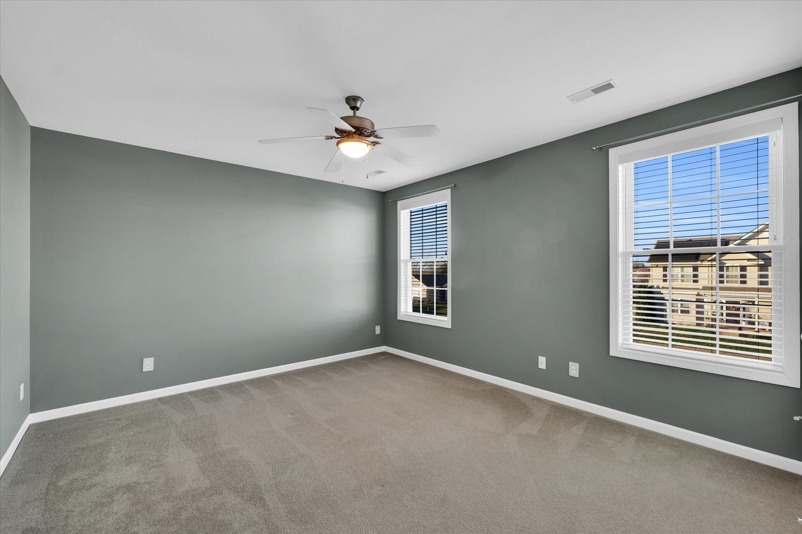 1330 West Ridge Lane Champaign, IL 61822 - Photo 20 of 39 a view of an empty room with a window