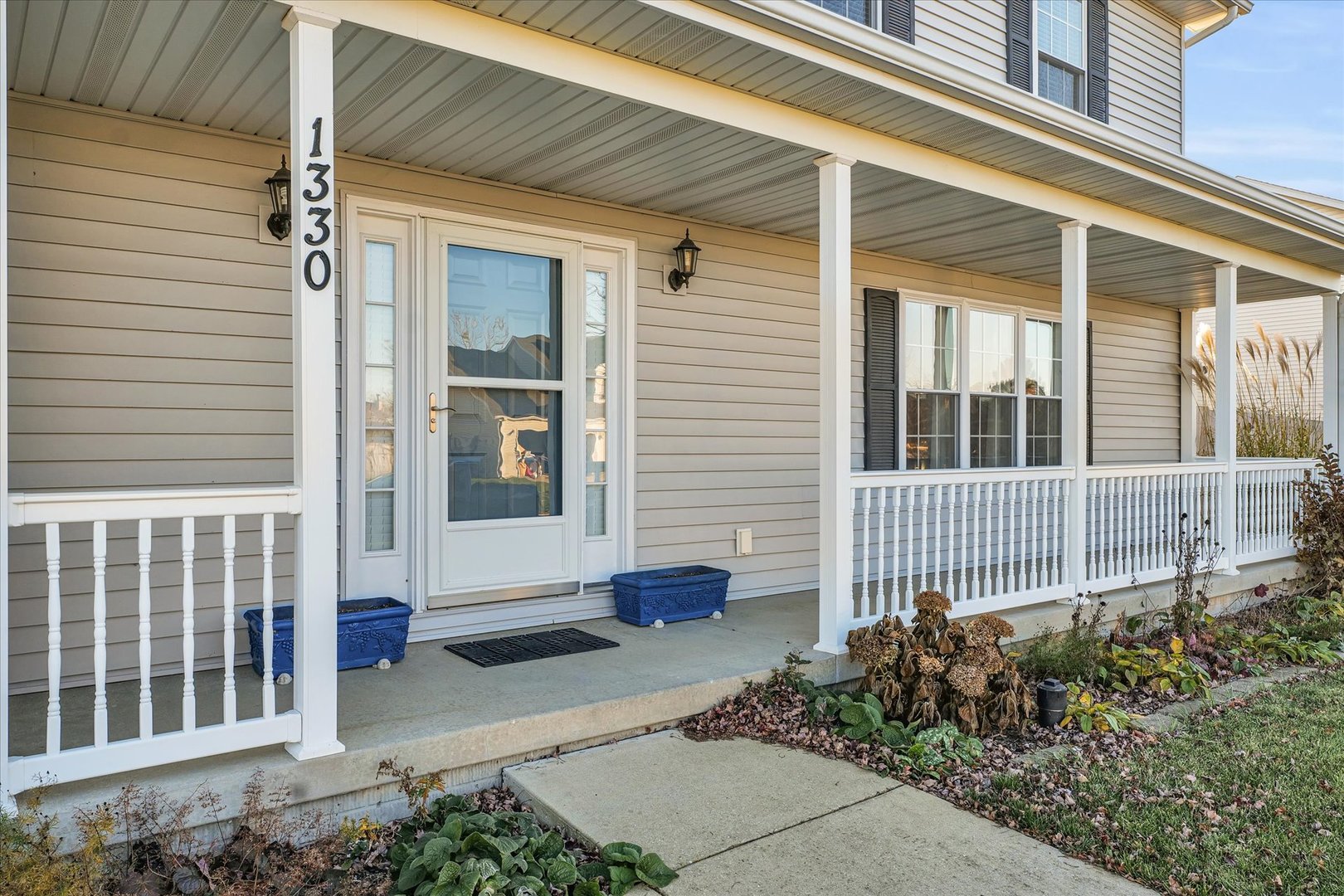 1330 West Ridge Lane Champaign, IL 61822 - Photo 2 of 39 a view of a house with a small yard and wooden floor and fence